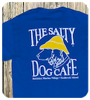 Man and boy wearing slaty dog t-shirts' looking at salty dog cafe sign.